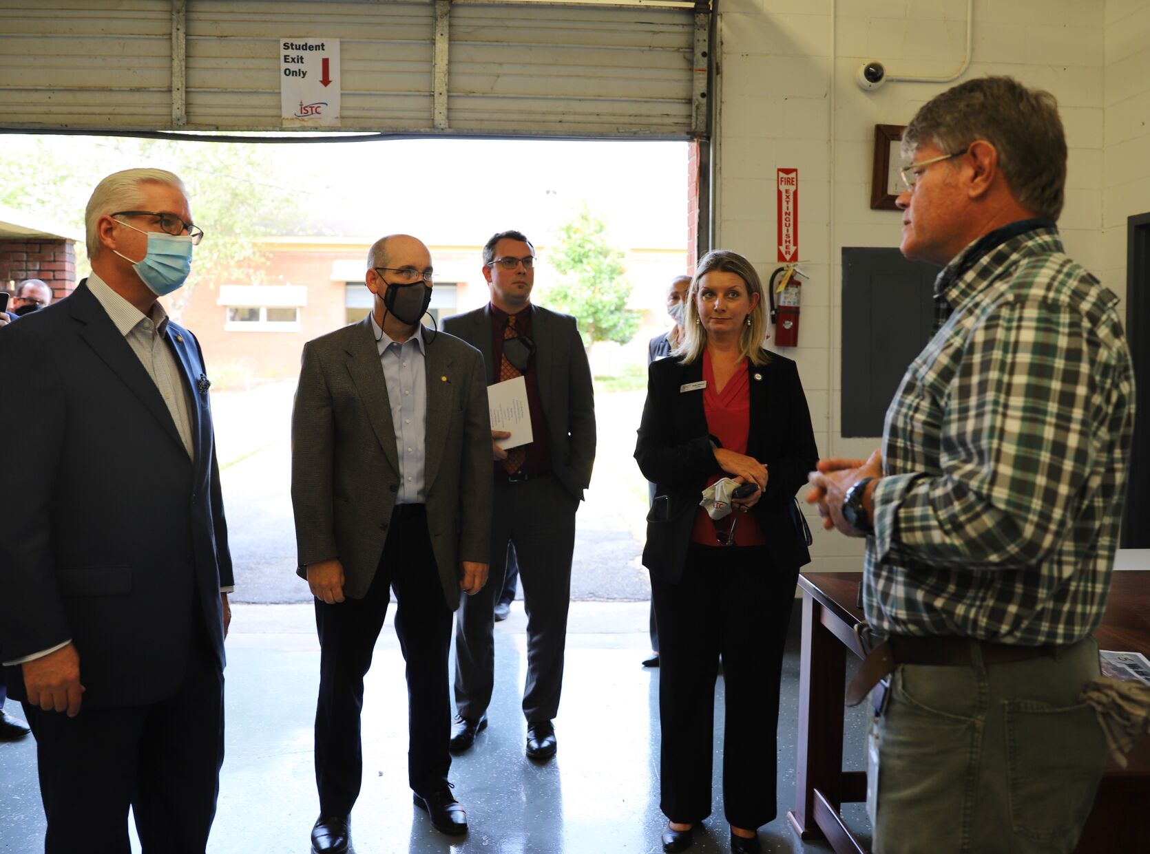 Senators Tour ISTC campus - candid with instructor.jpg